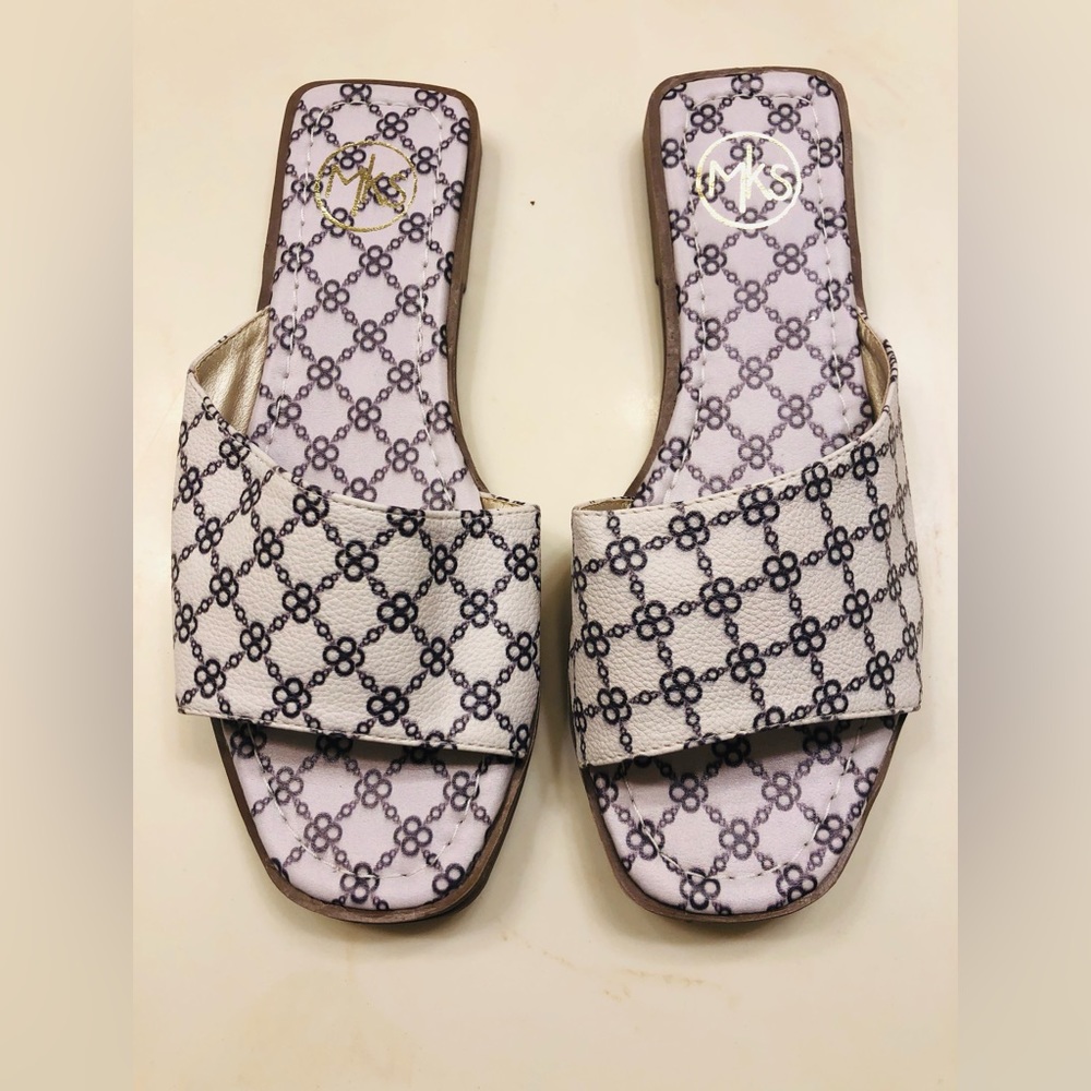 MKS Size 6 white black flat slip on leather sandals. Boutique brand